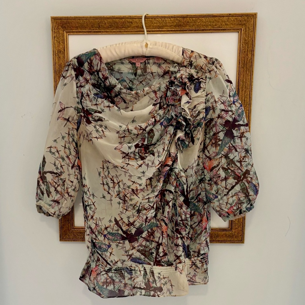 Ted Baker’s Floral Print Top.
 American sizes from 0-5, 0 is a 0, 1 is a 2.